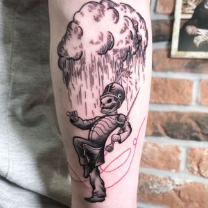 Join the skeletal band in the rain as they march through the clouds in this mesmerizing dotwork and illustrative tattoo by Liam Collins.