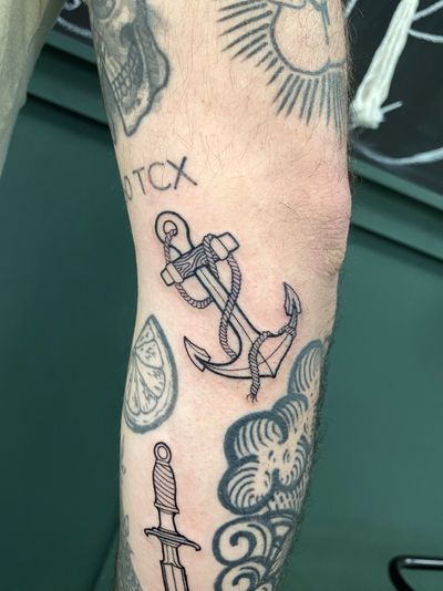Get a beautifully detailed anchor tattoo done by the talented artist Liam Collins. Perfect combination of art and symbolism.