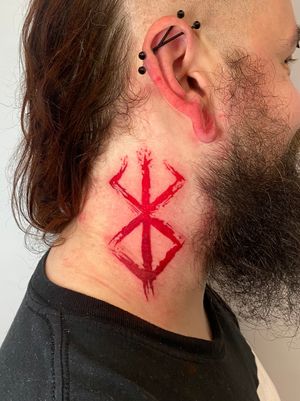 Bold and edgy trashpolka style neck tattoo created by talented artist Liam Collins. Express yourself with this unique and eye-catching design.