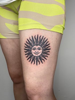 Capture the warmth and beauty of the sun with this stunning illustrative tattoo by talented artist Liam Collins.