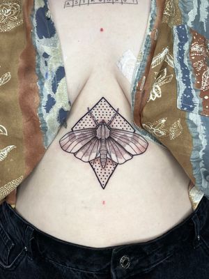 Unique and intricate moth design in dotwork and geometric style by artist Liam Collins.