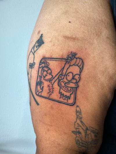 Get inked with a unique Simpsons inspired illustrative tattoo of Ned Flanders by talented artist Liam Collins.