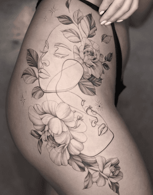 Elegant one line floral design with hidden faces, perfect for a subtle yet stylish hip tattoo. Designed by the talented artist, Kayla.