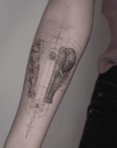 Unique micro-realism design by Kayla, combining geometric shapes with intricate detail for a stunning tattoo on the forearm.