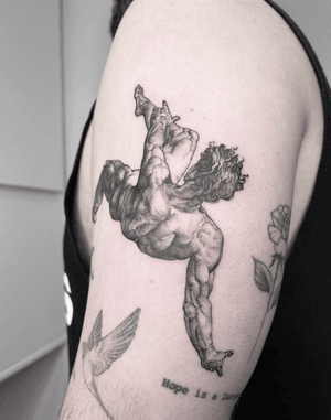 Fine line illustrative tattoo by Kayla depicting the tragic tale of Icarus falling from the sky, incorporating woodcut and etch motifs.