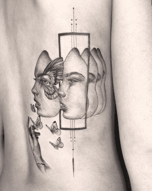 Kayla's intricate tattoo features a stunning woman's face in a blend of geometric and micro-realism styles on the back.