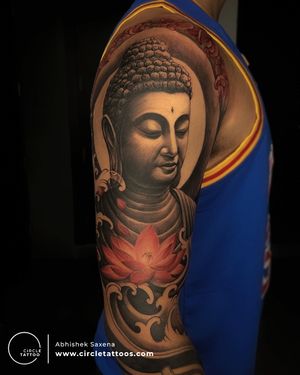 Custom Buddha Tattoo with a lotus made by Abhishek Saxena at Circle Tattoo Delhi