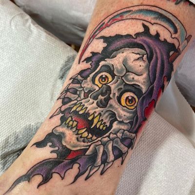 Embrace the dark side with this powerful Grim Reaper tattoo done in traditional style by renowned artist Gianluca Fusco.