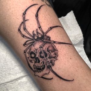 Unique dotwork illustration by Gianluca Fusco featuring a spider and skull motif, perfect for those seeking a bold and edgy design.