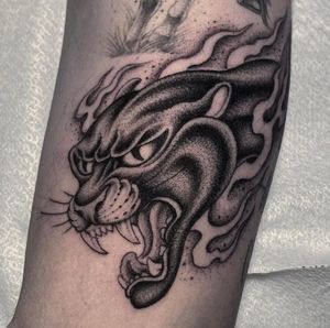 Unleash your wild side with this bold and timeless panther design by Gianluca Fusco.