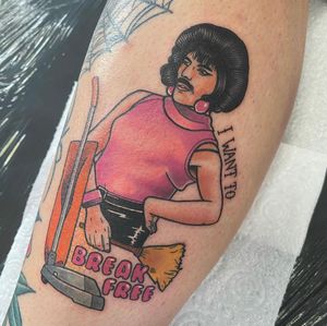 Celebrate Freddie Mercury's iconic 'I Want to Break Free' look with this small illustrative tattoo by Katy Sarsfield.