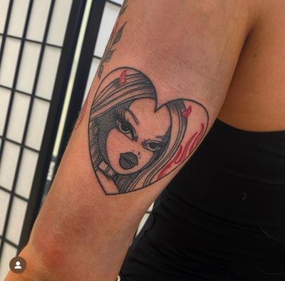 Illustrative tattoo by Katy Sarsfield featuring a devil, bratz doll, and flames entwined in a heart motif.