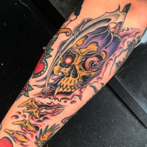 Capture the eerie beauty of death with this classic Grim Reaper design in traditional tattoo style by acclaimed artist Gianluca Fusco.