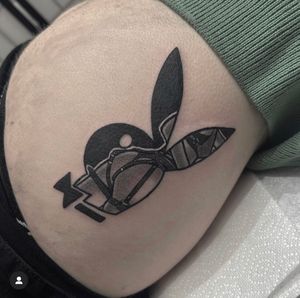 Unique and sensual tattoo design of a woman in BDSM playboy bunny motif by artist Katy Sarsfield.