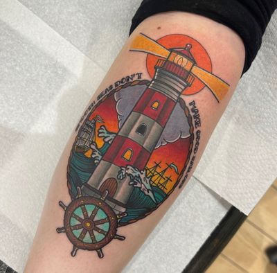 Get a stunning neo-traditional lighthouse tattoo on your lower arm by the talented artist Katy Sarsfield.