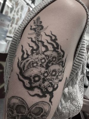 Get a unique and detailed illustrative tattoo of a skull and sword designed by talented artist Gianluca Fusco.