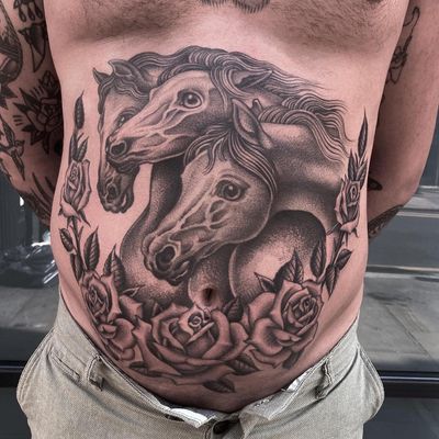Experience Gianluca Fusco's mastery of dotwork and illustrative style in this stunning tattoo featuring a majestic horse and delicate rose.