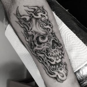 Get a bold and timeless skull tattoo in illustrative traditional style by the talented artist Gianluca Fusco.