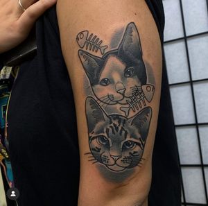 Illustrative tattoo of a cat with fishbone, done by artist Katy Sarsfield.