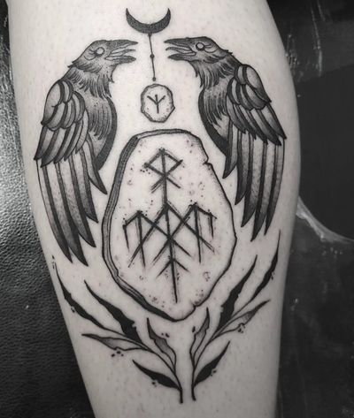 Blackwork tattoo by Elisa Thirteen featuring a crow, raven, and Norse rune, inspired by mythology.