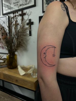 Elegant moon, star, and crescent design by tattoo artist Jack Howard. Perfect choice for subtle and delicate body art.