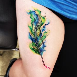 Feather watercolor tattoo by Daniel Natural