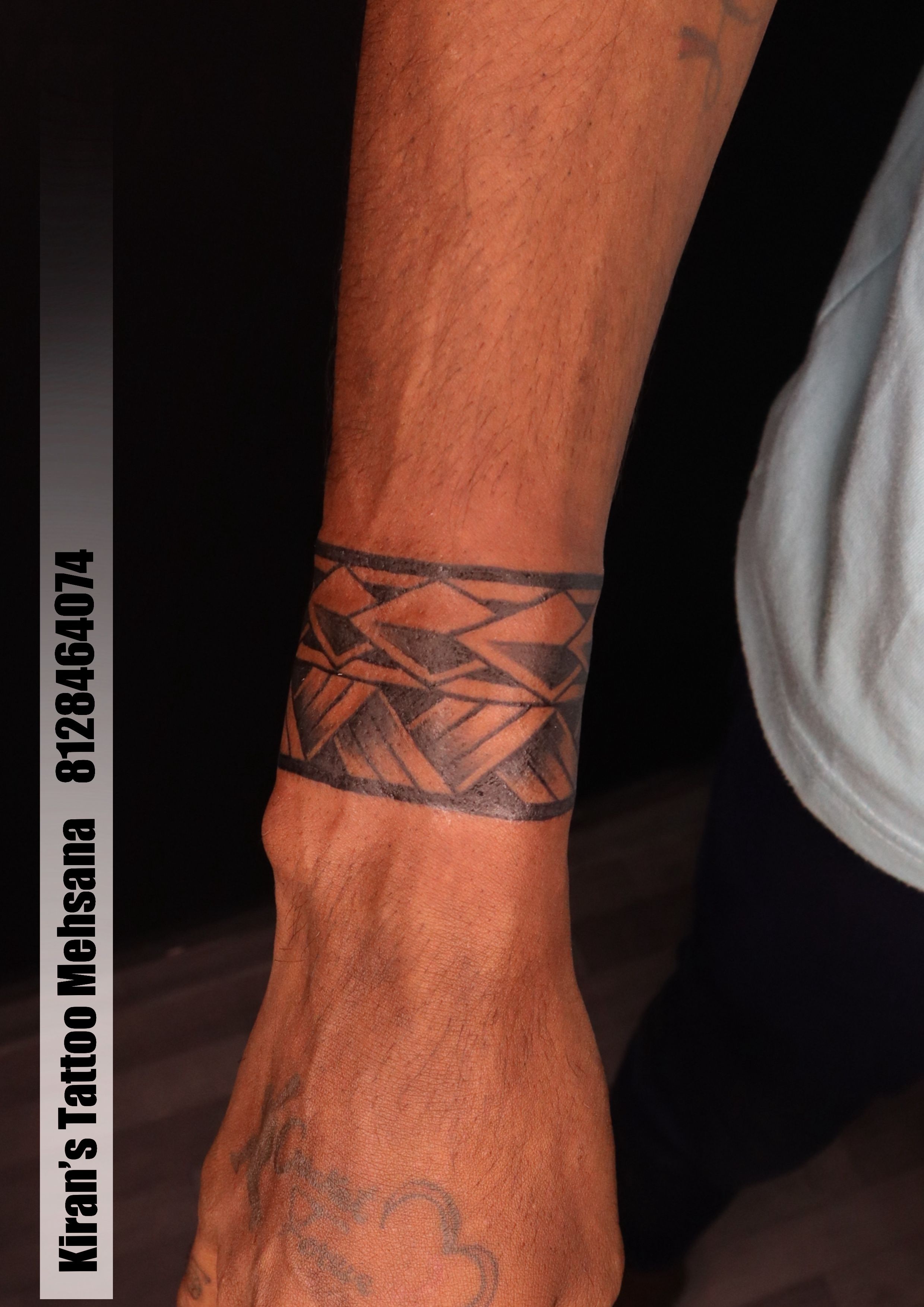 Om trishul armband tattoo | customised polynesian armband | Finger tattoos, Arm  band tattoo, Tattoos