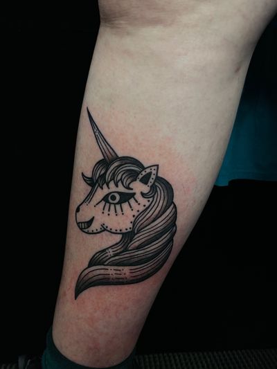 Show off your mystical side with a beautifully detailed unicorn tattoo in etching style artistry by Jess. Unique and timeless design.
