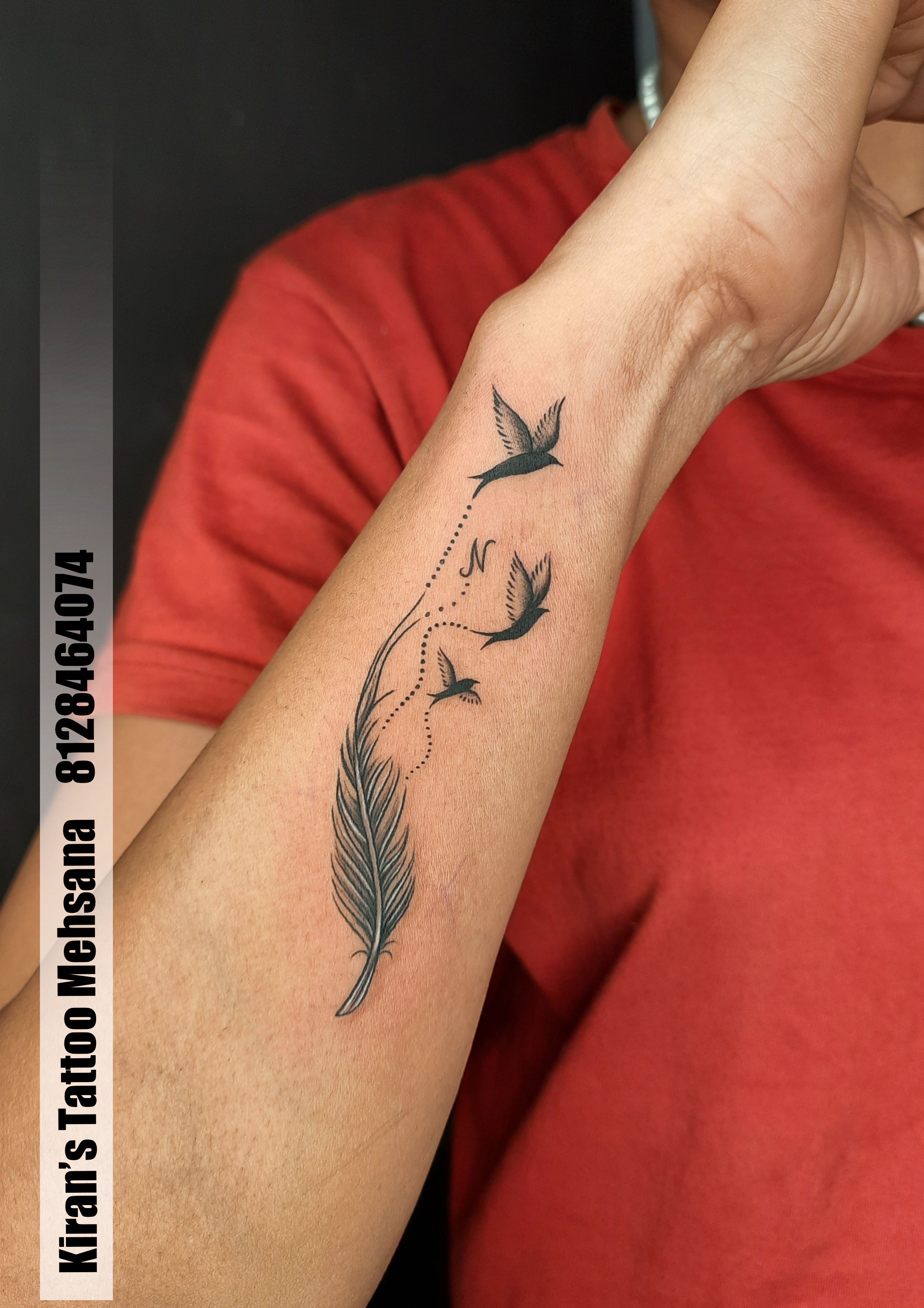 Feather tattoo by Guillaume Martins | Photo 24442