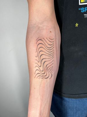 Intricate wavy lines come to life in this unique hand poke tattoo by artist Danyul. A stunning abstract design that is sure to stand out.