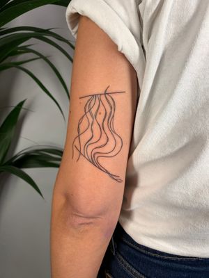 Get mesmerized by the intricate lines and graceful flow of this illustrative tattoo by Dan Bramfitt, also known as Danyul.