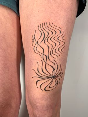 Get inked with stunning wavy lines and tile patterns in this geometric tattoo by artist Dan Bramfitt, also known as Danyul.