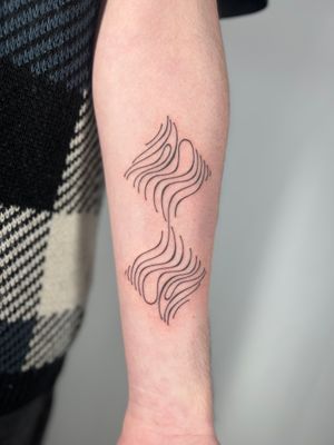 Elegant hand poke tattoo with wavy abstract lines by talented artist Danyul.