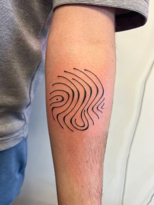 Experience the mesmerizing beauty of wavy lines in this illustrative tattoo by Dan Bramfitt, known as Danyul. Let the lines flow gracefully on your skin.