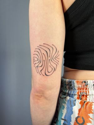 Unique illustrative hand_poke tattoo by Danyul featuring flowing wavy lines for a mesmerizing effect.
