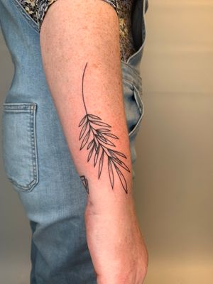 Beautiful fine line illustrative tattoo of rosemary branch and herbs by Dan Bramfitt aka Danyul.