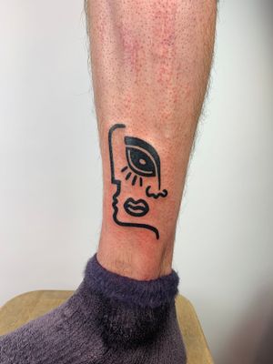 Experience the artistry of Dan Bramfitt with this illustrative and surrealism tattoo inspired by Picasso. Truly unique and breathtaking.