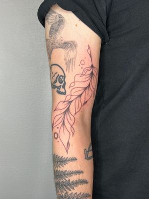 Illustrative tattoo by Dan Bramfitt aka Danyul showcasing a beautiful branch with leaves in fine line style.