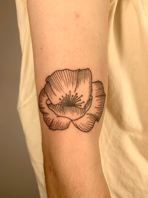 Fine line flower tattoo by Dan Bramfitt, aka Danyul, featuring an illustrative and ignorant design.