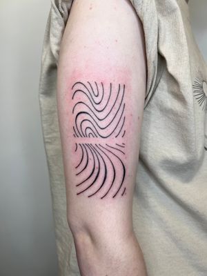 Get mesmerized by Dan Bramfitt's fine line and illustrative style tattoo featuring fluid wavy lines and intricate details.