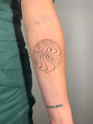 Elegant and intricate fine line design by artist Dan Bramfitt, featuring wavy and flowing abstract lines.
