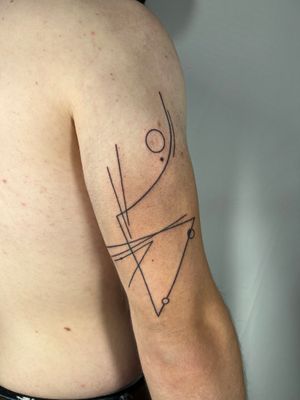 Discover the intricacy of Dan Bramfitt's fine line geometric abstract tattoo design. A masterpiece for your body art collection.