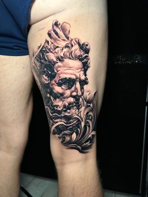 Capture the power of Zeus with this stunning black & gray realism tattoo by Avi, inspired by Greek mythology.