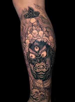 Embrace the fierce and protective energy of Mahakala with this stunning Japanese tattoo by Avi. Symbolizing power and transformation, this intricate design is a bold statement of strength and wisdom.