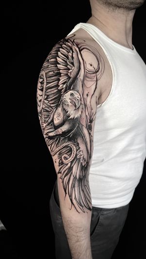 Blackwork tattoo of a detailed sketch style eagle done by artist Helena Velazquez.