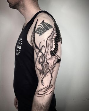 Get a stunning sketch-style heron crane tattoo by Helena Velazquez.