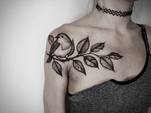 Enjoy the intricate details of this illustrative blackwork tattoo featuring a bird on a branch, beautifully crafted by Helena Velazquez.