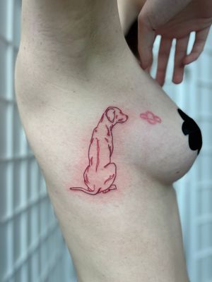 Get your beloved pet inked in fine red lines by Well Good Mate for a unique and minimalist look.