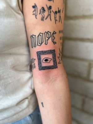 Get a unique and quirky tattoo featuring a delicate fine line illustration of a frame with a fried egg motif by Well Good Mate.