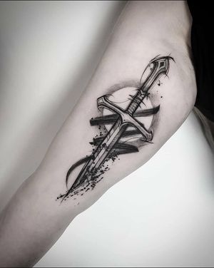Unique blackwork and watercolor tattoo design featuring a sword and brush sketch, done by artist Helena Velazquez.